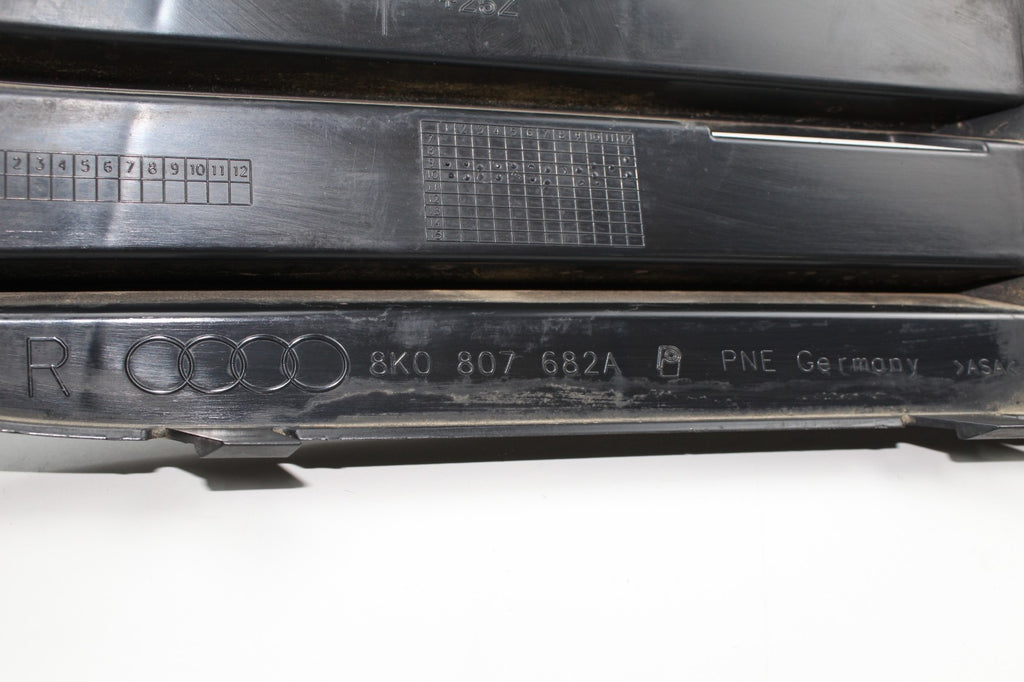 2009-12 AUDI A4 FRONT RIGHT FOG LIGHT GRILLE OEM 8K0807682A